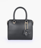Black handbag with flower charm