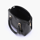 Black handbag with flower charm