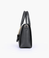 Black handbag with flower charm