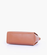 Brown handbag with flower charm
