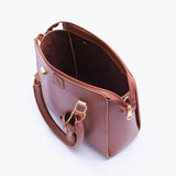 Brown handbag with flower charm