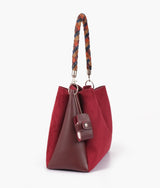 Burgundy suede handbag with braided handle