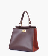 Dark brown suede front lock top-handle mini bag