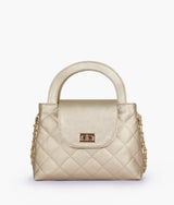 Golden flap quilted bag with top handle