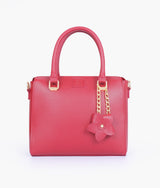 Red handbag with flower charm