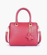 Red handbag with flower charm