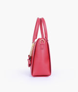 Red handbag with flower charm