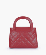 Red flap quilted bag with top handle