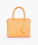 Mustard handbag with flower charm