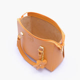 Mustard handbag with flower charm
