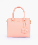 Peach handbag with flower charm